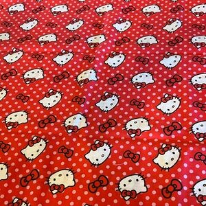 Hello Kitty Red Fabric with Pink Polka Dots by Springs Creative